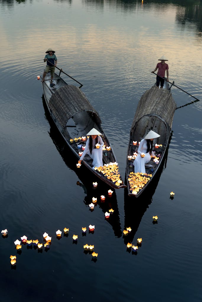 Contact Us Scenic view of traditional lantern boats on the tranquil Perfume River in Hue, Vietnam.